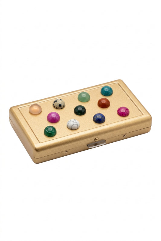 Gold and multi-color cigarette case by The Vault Creative, featuring a sleek design with vibrant accents and secure clasp.