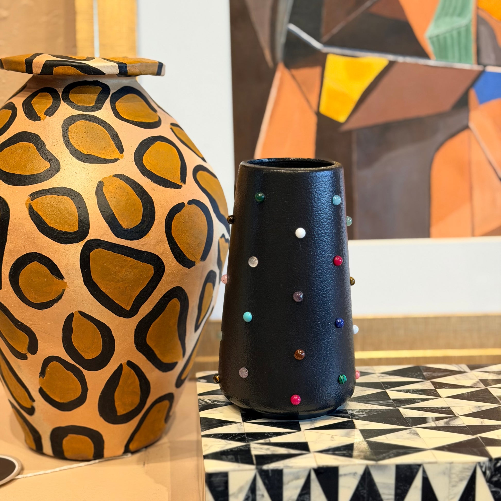 The Vault Creative P. Grunsfeld Tinies 6-inch ceramic vase with a smooth, glossy finish and modern design.