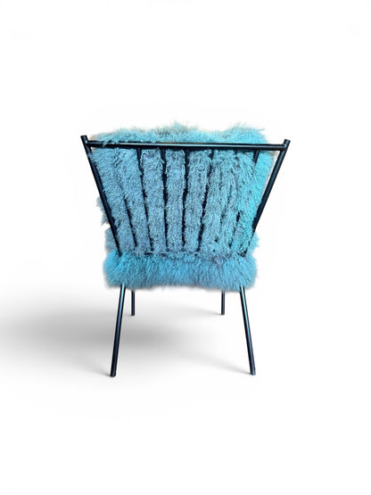 Curly lamb chair by The Vault Creative with plush, textured curly lamb upholstery and modern design.
