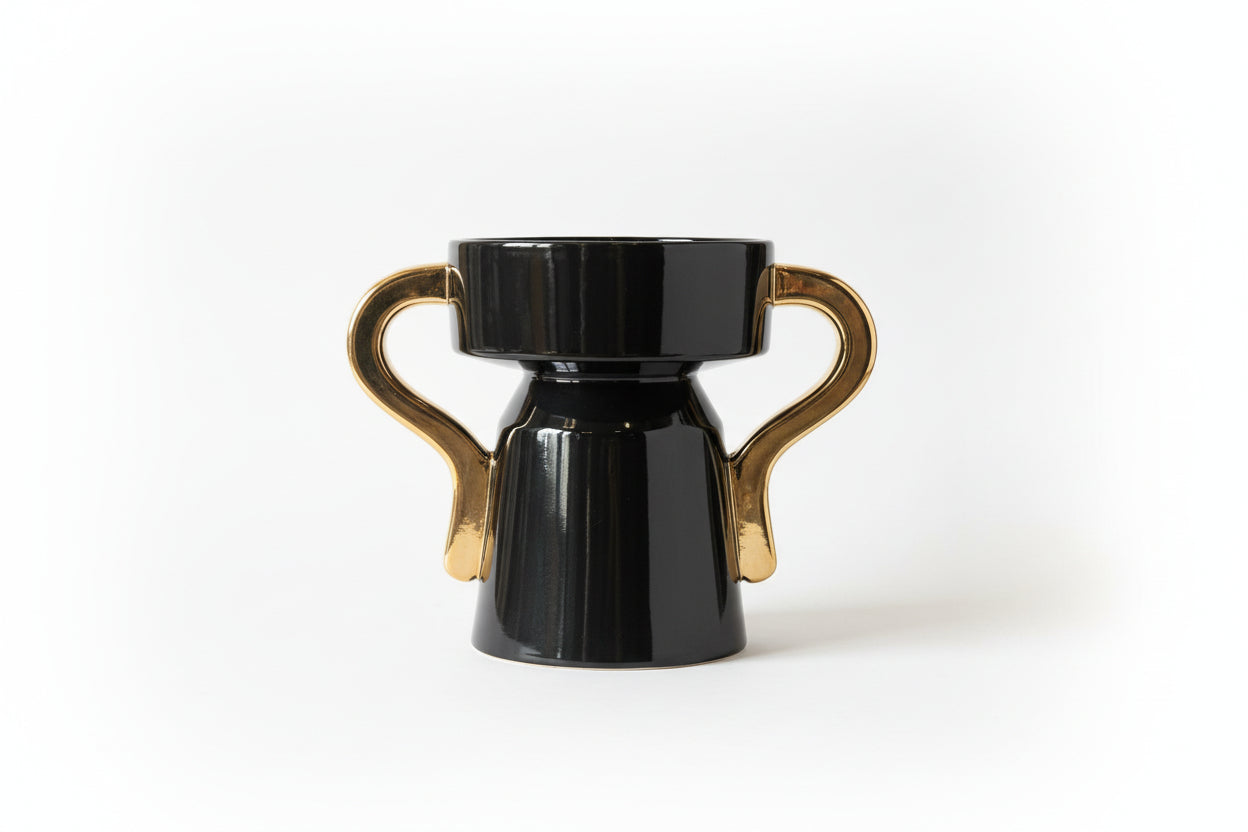 French black and gold ceramic vase by The Vault Creative, featuring elegant design and glossy finish for stylish home decor.