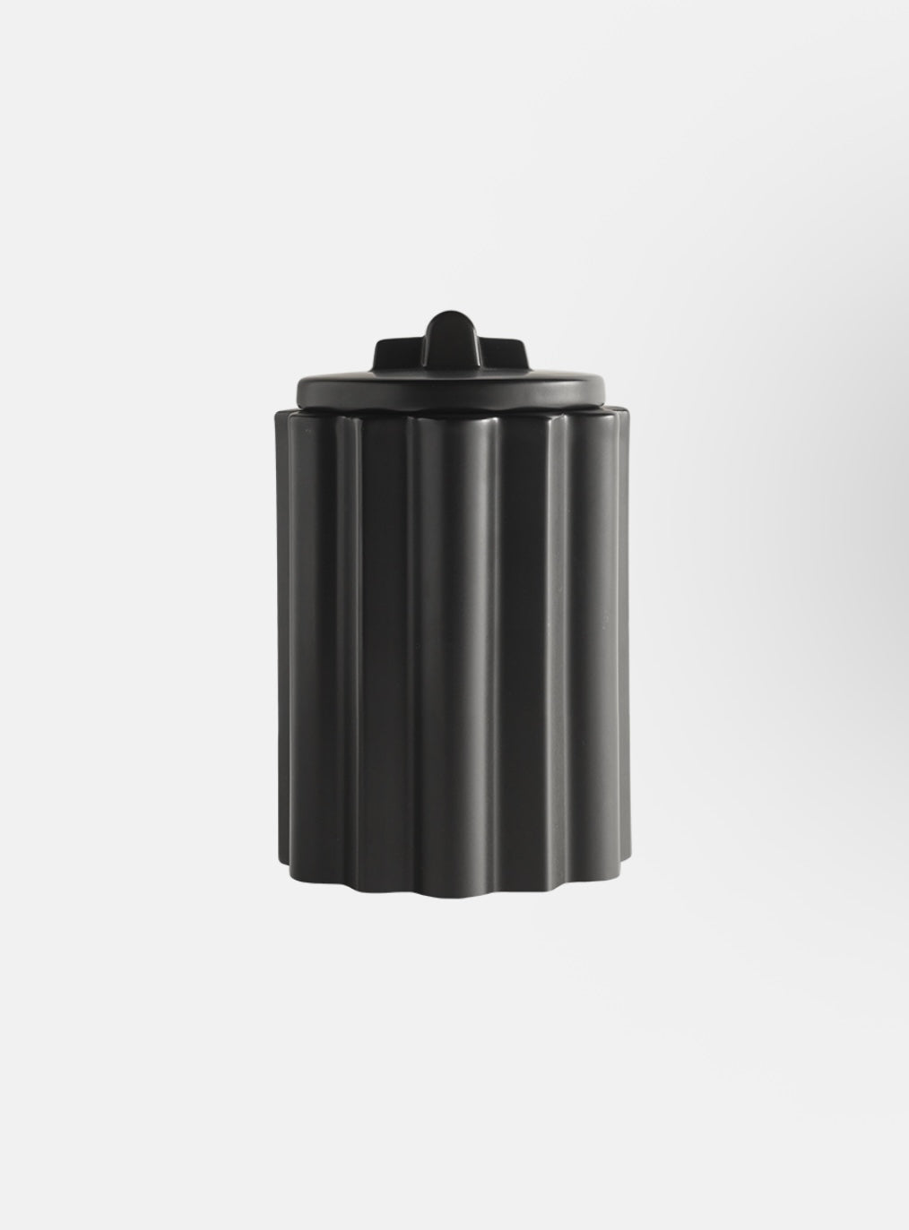 Medium black Changes Jar by ST x OH, featuring a sleek, modern design with a secure lid for storing small items.