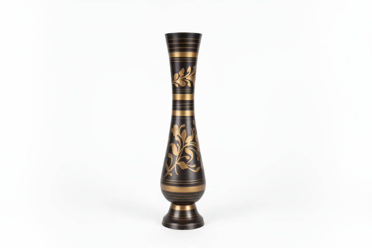 Hand-engraved vintage metal vase by The Vault Creative with intricate engraved patterns and a classic, timeless design.