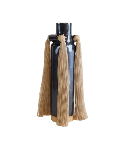 Black and cream ceramic vase by The Vault Creative featuring the Karen Tinney design, with a sleek, modern shape.