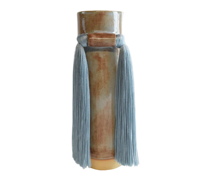 Blue ceramic vase by Karen Tinney from The Vault Creative, featuring a smooth, rounded design perfect for home decor.