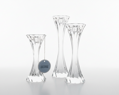 Set of Ozmun Home twisted crystal candle holders with elegant, spiral design perfect for decorative lighting or centerpieces.