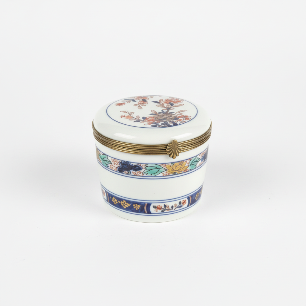 Vintage Limoges porcelain box with intricate floral design, crafted by The Vault Creative, showcasing fine craftsmanship and delicate details.