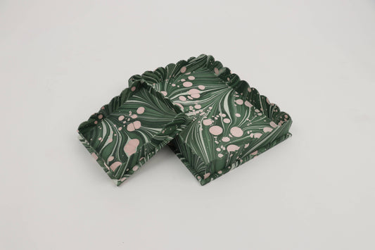 Craft Boat marbled scalloped tray set with fire whirl green design, showcasing elegant, colorful ceramic trays on a neutral background.