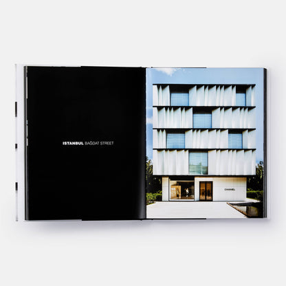 Cover of "The Architecture of Chanel" book by Phaidon featuring a Chanel building design in gold and black.