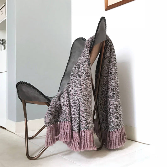 Malagoon mauve pink throw blanket with soft woven texture and fringed edges