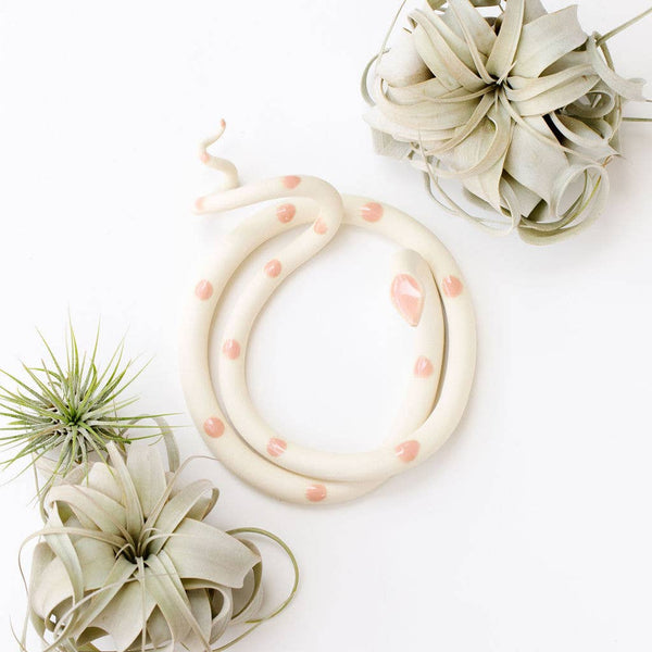Large ceramic snake sculpture by Carter & Rose, detailed textured ceramic snake figure for home decor.