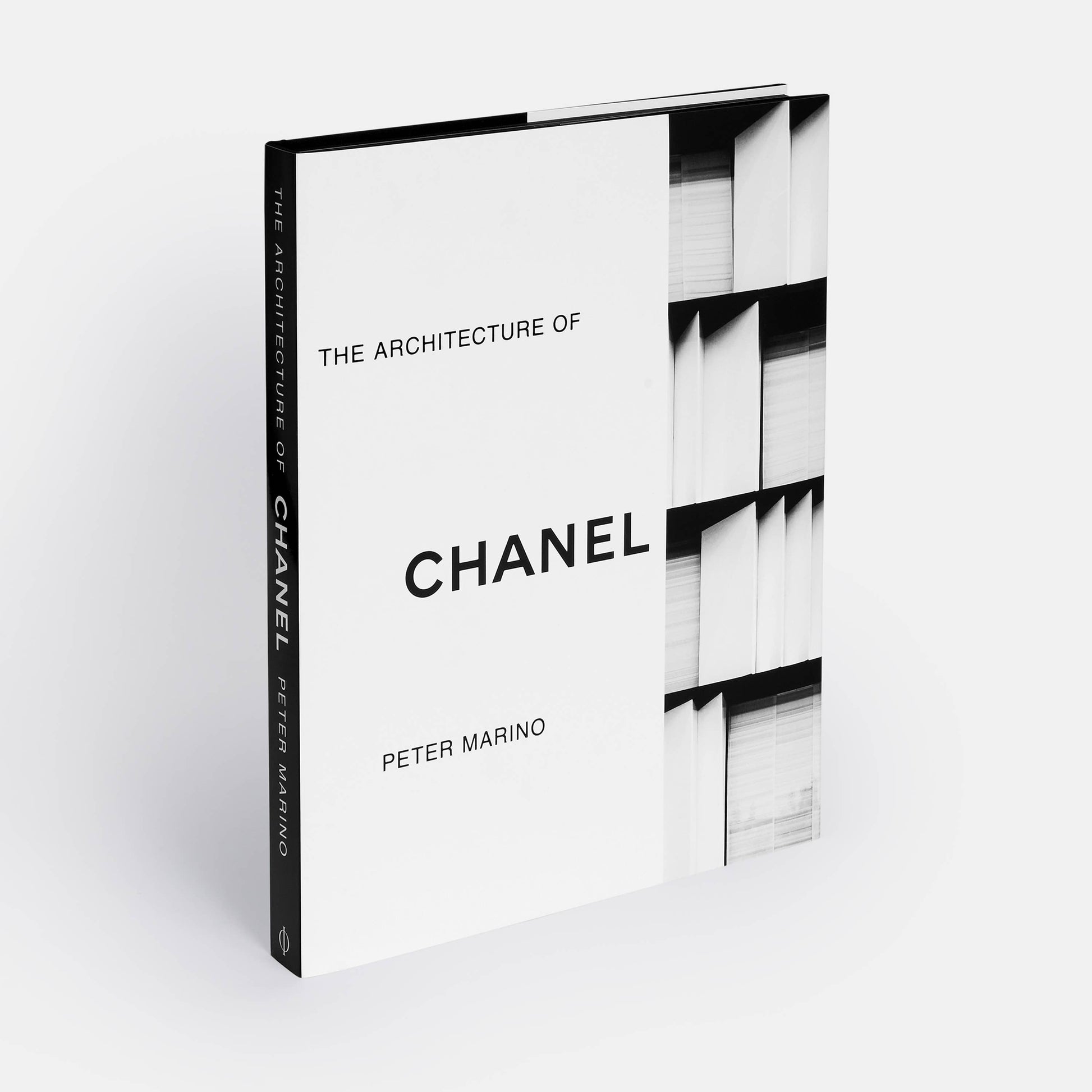 Book cover of "The Architecture of Chanel" by Phaidon featuring a stylish Chanel-inspired building design.