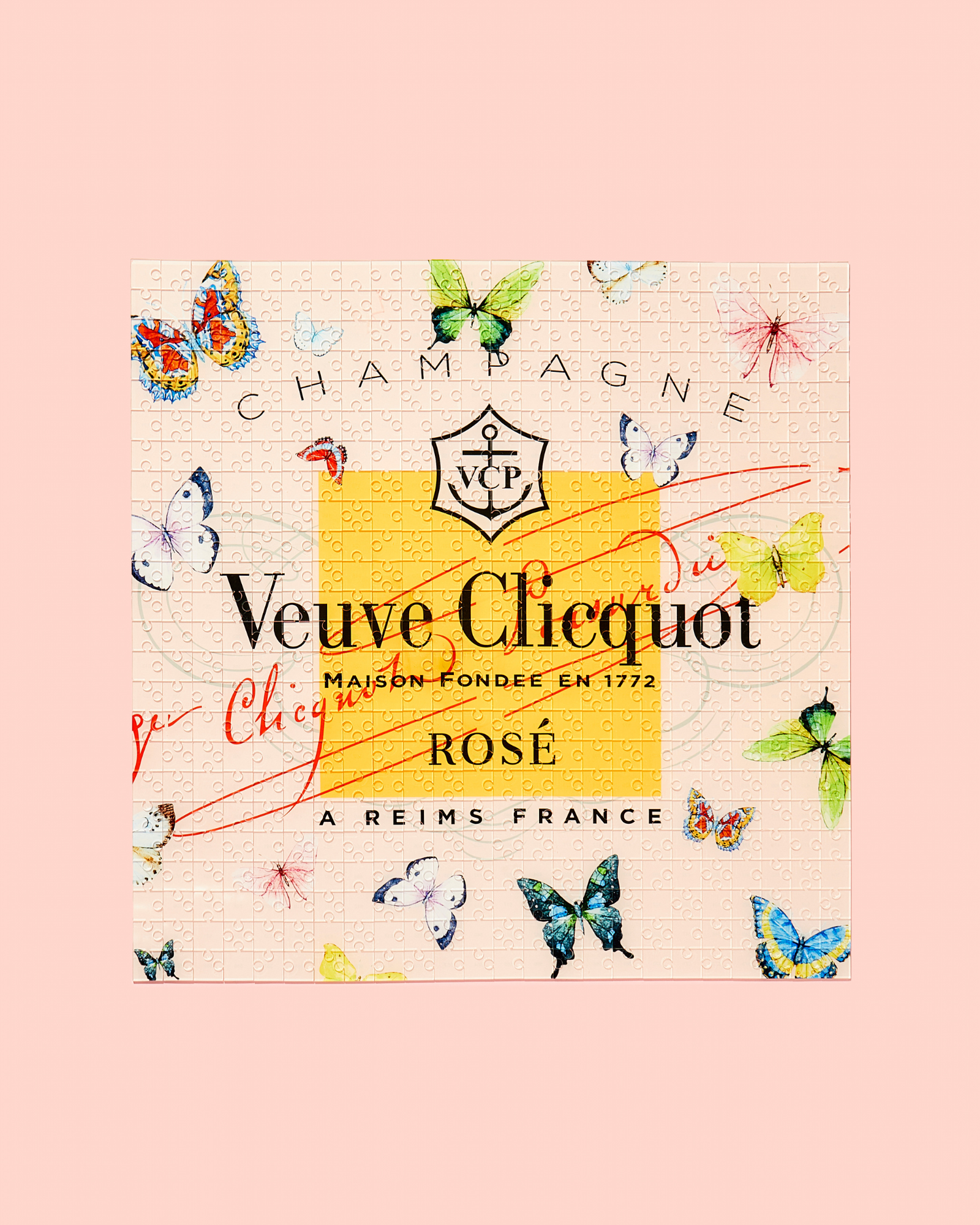 Colorful Rose Butterfly Acrylic Puzzle from Tart By Taylor featuring vibrant floral and butterfly design on clear acrylic pieces.