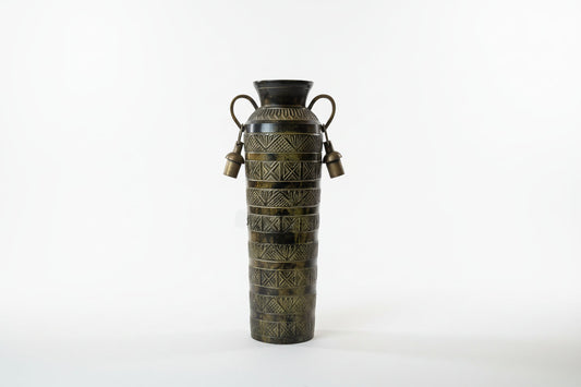Decorative brass vase with intricate patterns, showcasing a sleek, polished design perfect for elegant home decor.