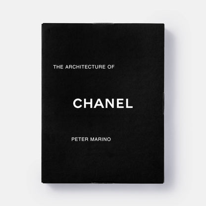 Book cover of "The Architecture of Chanel" by Phaidon featuring a Chanel-inspired building design and elegant architectural details.