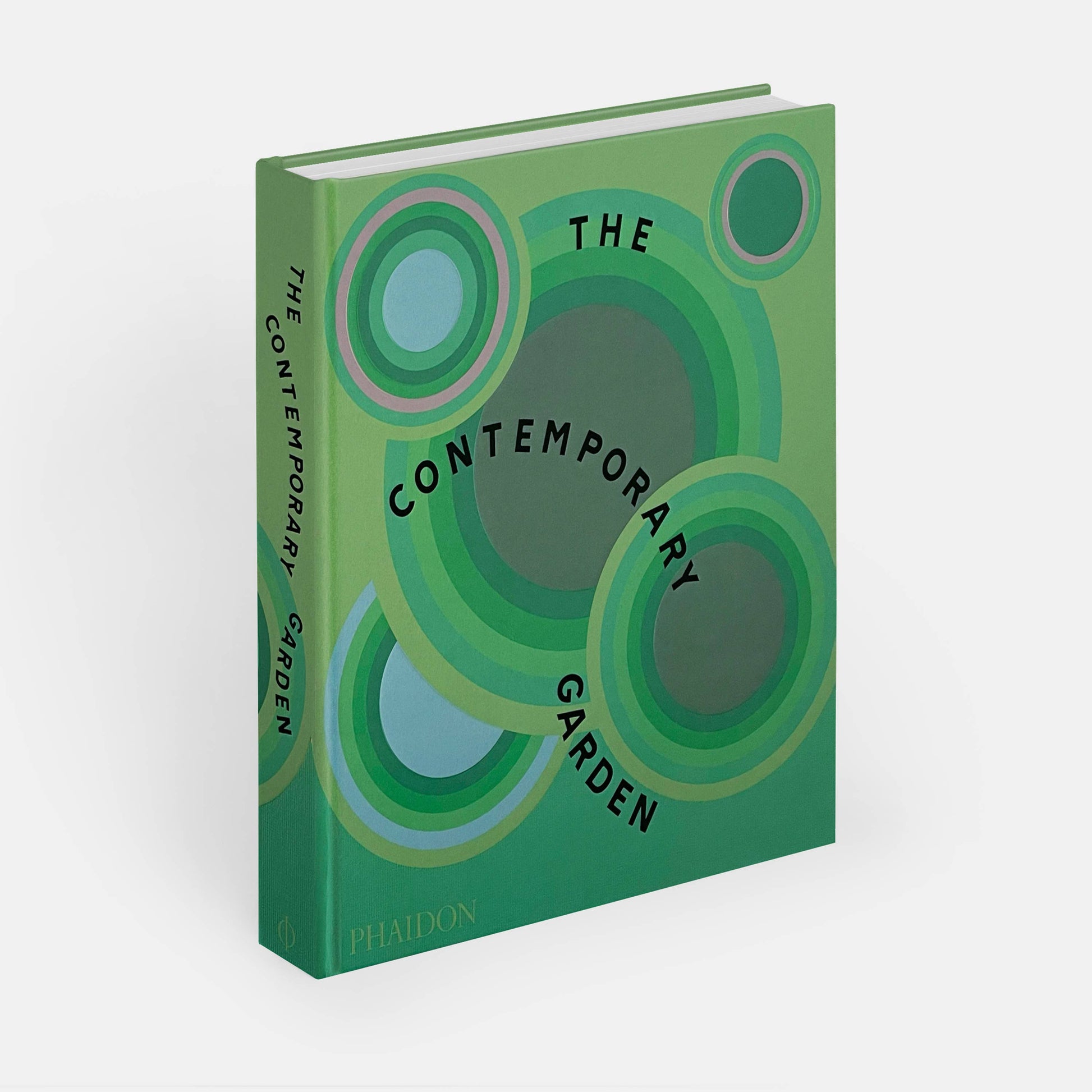 Open book titled "The Contemporary Garden" by Phaidon, showcasing colorful garden photography on white background.