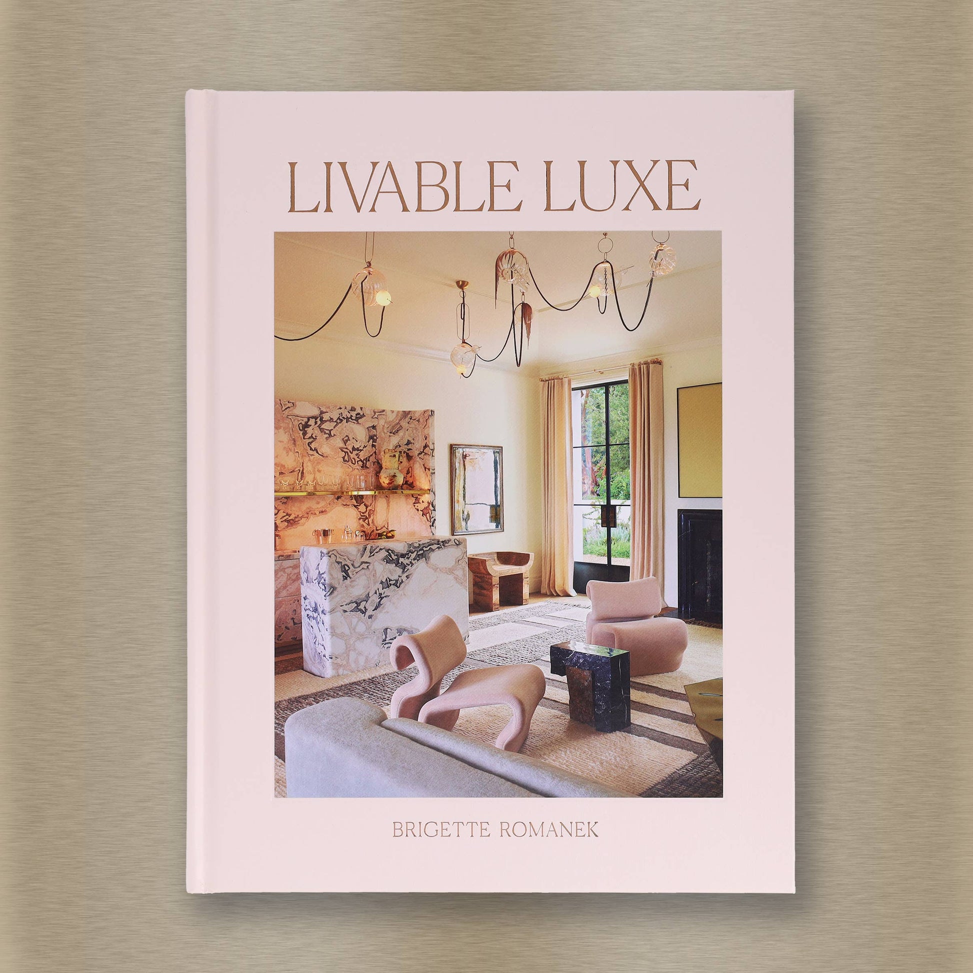 Livable Luxe book cover by Chronicle Books featuring elegant design with gold accents and modern typography.