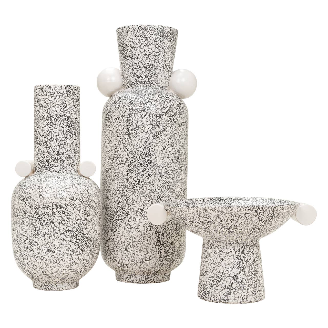 Kavana Decor Eridan vase with a sleek, modern design in neutral tones, perfect for decorative display.