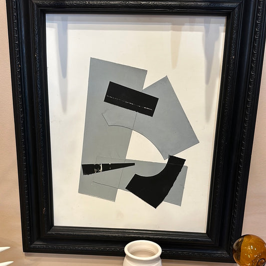 Black and white collage artwork in a framed design by Stone Textile Studio, featuring abstract and geometric patterns.