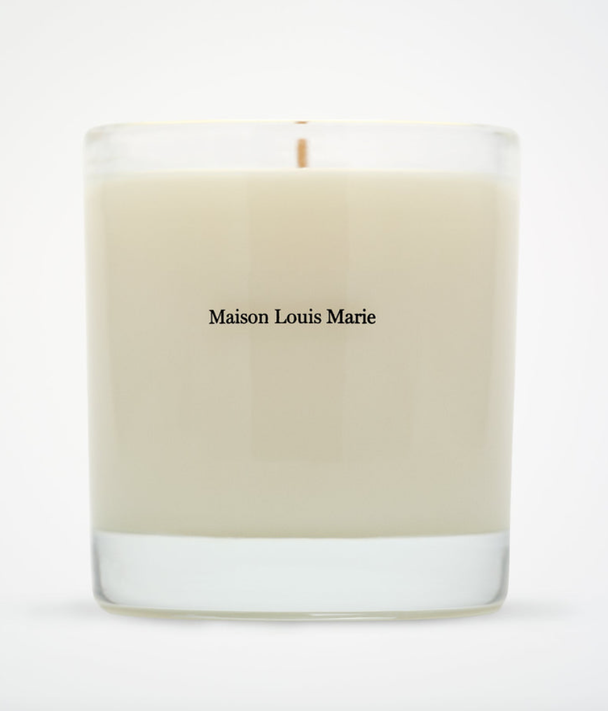 Maison Louis Marie No. 04 Bois de Balincourt candle by The Vault Creative with a sleek glass container and warm, inviting scent.