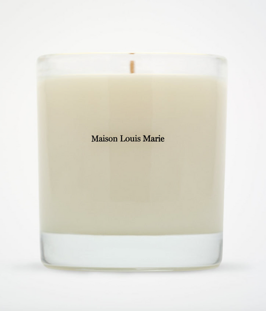 Maison Louis Marie No. 04 Bois de Balincourt candle by The Vault Creative with a sleek glass container and warm, inviting scent.